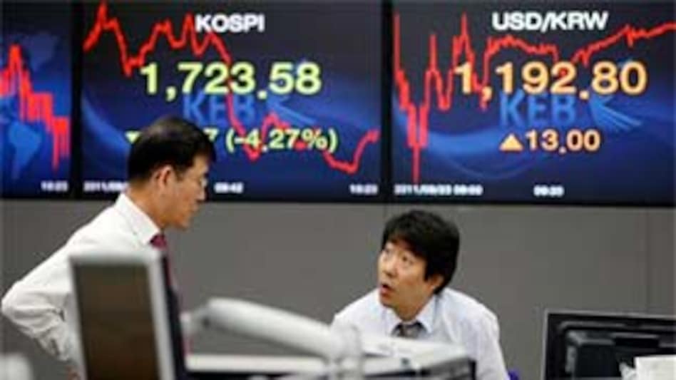 Currency traders at the foreign exchange dealing room of the Korea Exchange Bank headquarters. <em>Photo: AP</em> Currency traders at the foreign exchange dealing room of the Korea Exchange Bank headquarters. <em>Photo: AP</em>