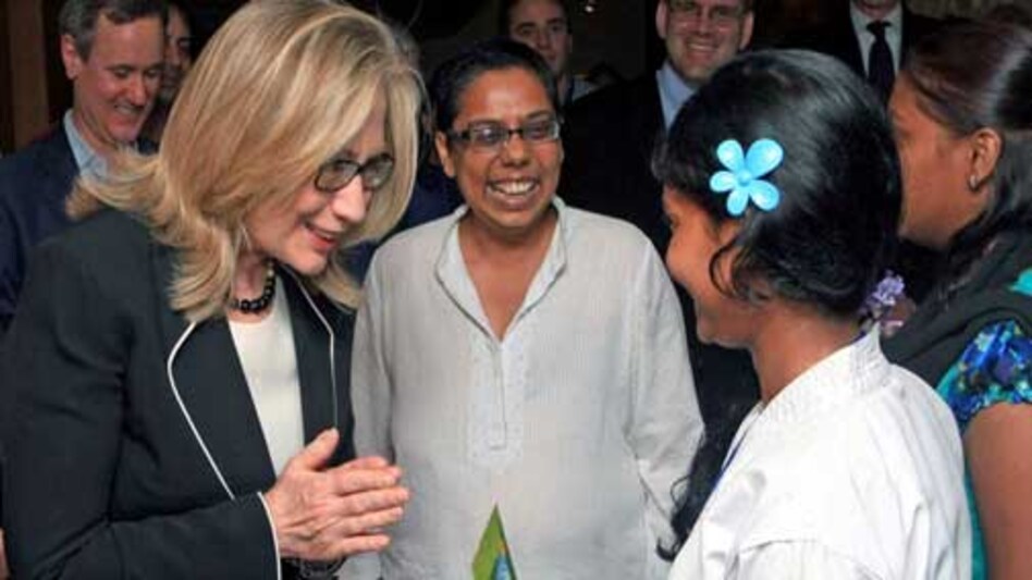 US Secretary of State Hillary Clinton (with hands folded) during her visit to Kolkata. US Secretary of State Hillary Clinton (with hands folded) during her visit to Kolkata.