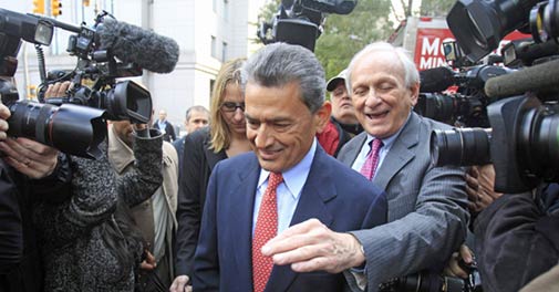 Rajat Gupta leaves federal court in New York with his lawyer Gary Naftalis, right, on Wednesday. Photo: AP