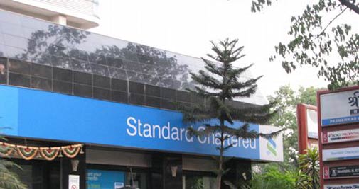Standard Chartered first-half profit up 12%