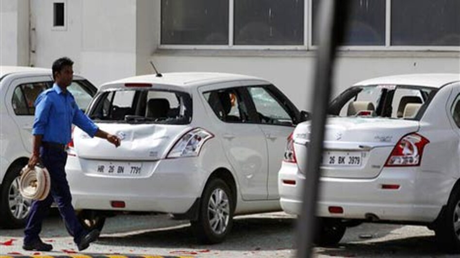 Damaged cars outside Maruti's Manesar plant in Haryana. Maruti's Manesar plant saw violent protest by the workers on July 18, 2012. Damaged cars outside Maruti's Manesar plant in Haryana. Maruti's Manesar plant saw violent protest by the workers on July 18, 2012.