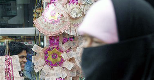 Rupee loses 52 paise to slip below 54-mark ahead of RBI meet