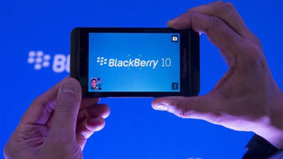 A BlackBerry executive shows off the new Z10 model during its launch in Toronto on January 30, 2013. (Photo: AP) A BlackBerry executive shows off the new Z10 model during its launch in Toronto on January 30, 2013. (Photo: AP)