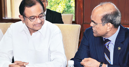 Finance minister P. Chidambaram with RBI governor D. Subbarao in New Delhi on Friday. Chidambaram hoped that RBI will consider the fiscal consolidation path shown in the Budget while taking a call on interest rate in its coming policy review on March 19.