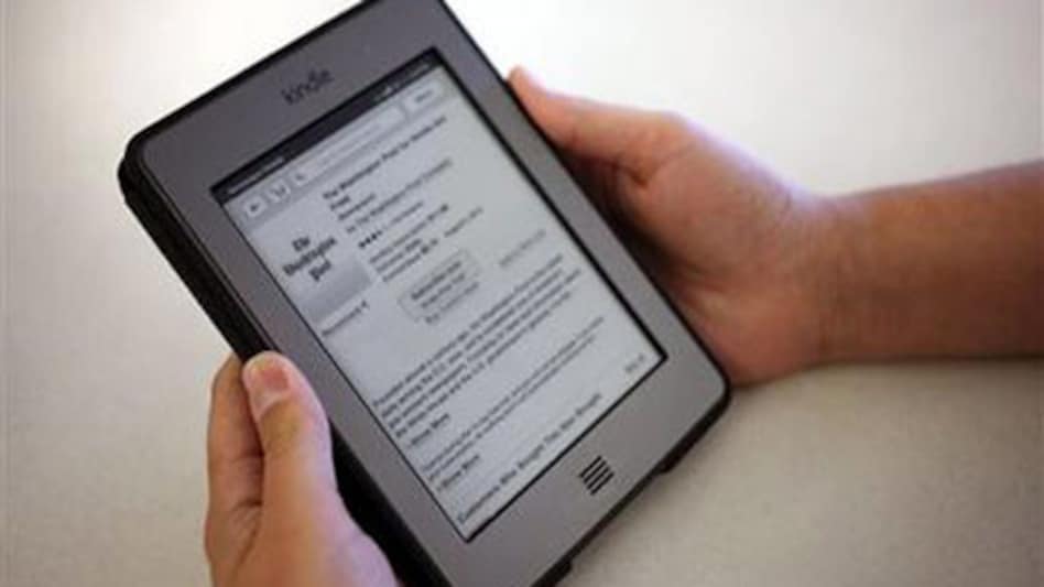 The Washington Post for Kindle application is displayed for purchase on an Amazon Kindle in New York. The Washington Post Co., announced on Aug 5, 2013 that Jeff Bezos, the Amazon.com founder is buying The Washington Post. <em>Photo: AP</em> The Washington Post for Kindle application is displayed for purchase on an Amazon Kindle in New York. The Washington Post Co., announced on Aug 5, 2013 that Jeff Bezos, the Amazon.com founder is buying The Washington Post. <em>Photo: AP</em>