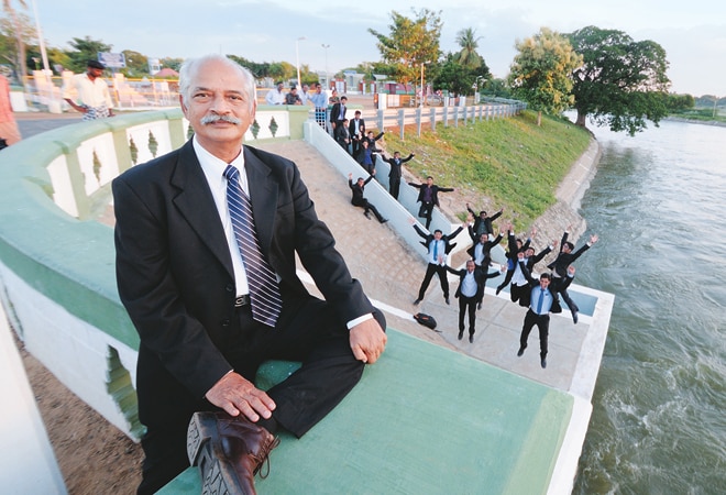 Close to industry: Director A. Nagarajan, with students in the background, at the BIM campus in Trichy. PHOTOS: H.K. Rajashekar