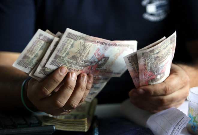 Indian rupee drops 48 paise vs dollar to 61.55