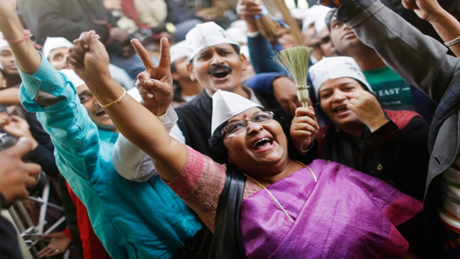 Supporters of Aam Aadmi Party leader Arvind Kejriwal celebrate after his win against former Delhi CM Sheila Dikshit in New Delhi on December 8. PHOTO: Reuters Supporters of Aam Aadmi Party leader Arvind Kejriwal celebrate after his win against former Delhi CM Sheila Dikshit in New Delhi on December 8. PHOTO: Reuters
