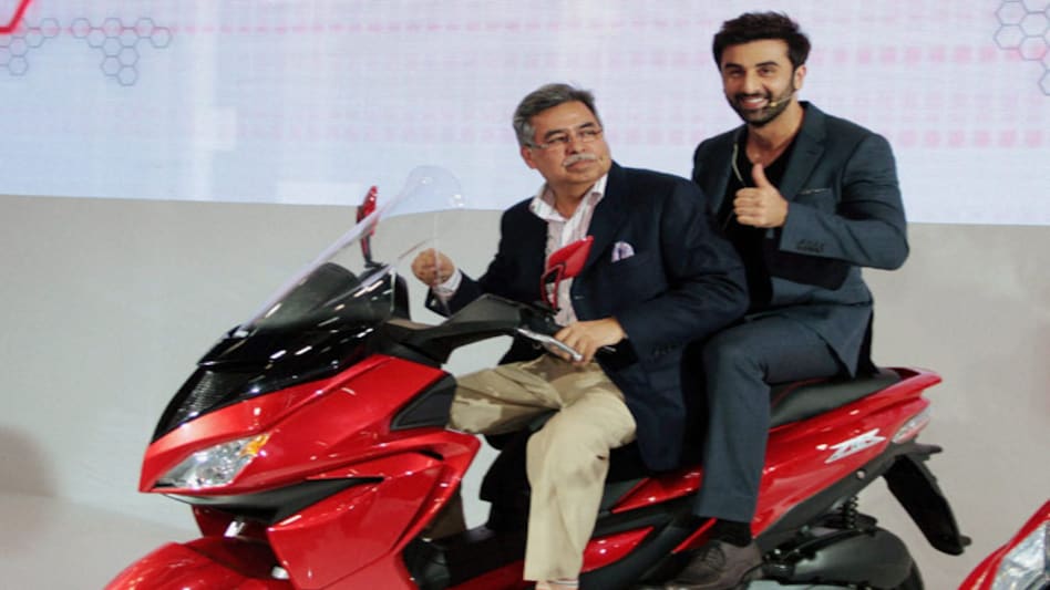 Bollywood actor Ranbir Kapoor with Pawan Munjal, MD and CEO Hero MotoCorp, at the Auto Expo 2014 in Greater Noida. PTI Bollywood actor Ranbir Kapoor with Pawan Munjal, MD and CEO Hero MotoCorp, at the Auto Expo 2014 in Greater Noida. PTI