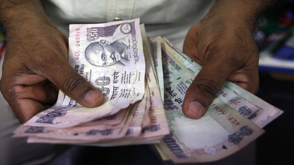 Rupee closes 9 paise lower against dollar Rupee closes 9 paise lower against dollar
