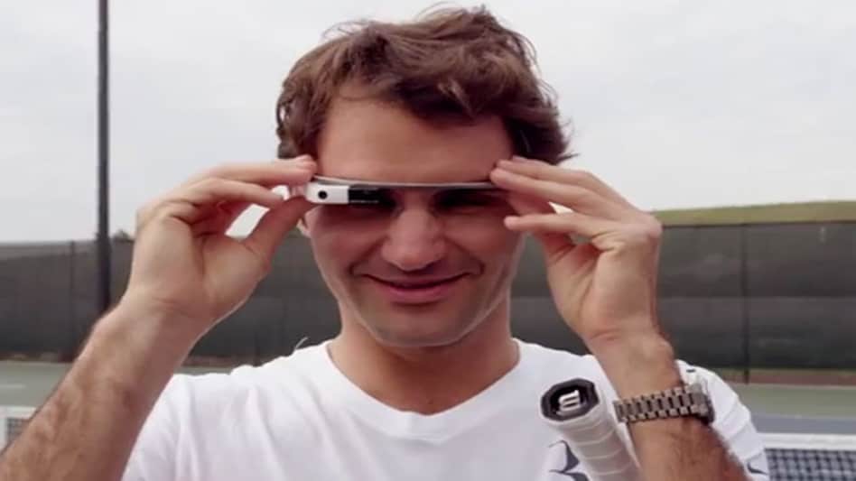 Tennis player Roger Federer on court wearing Google Glass Tennis player Roger Federer on court wearing Google Glass