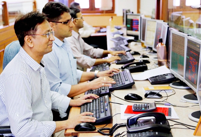 Sensex closes shy of 24,000 level on exit polls forecast