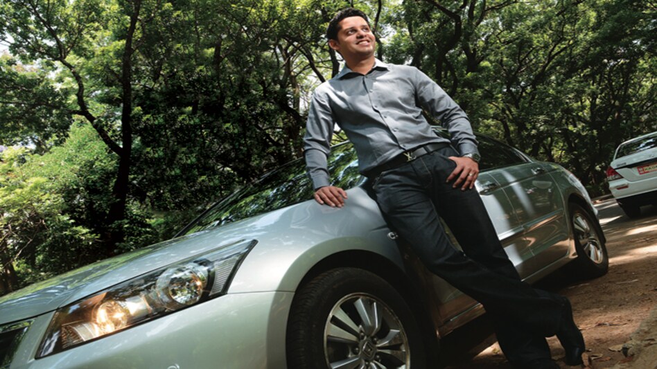 Bhavik Rathod, Uber's General Manager in Bangalore, leaning against one of the Uber cabs <em>Photo: Nilotpal Baruah/www.indiatodayimages.com</em> Bhavik Rathod, Uber's General Manager in Bangalore, leaning against one of the Uber cabs <em>Photo: Nilotpal Baruah/www.indiatodayimages.com</em>