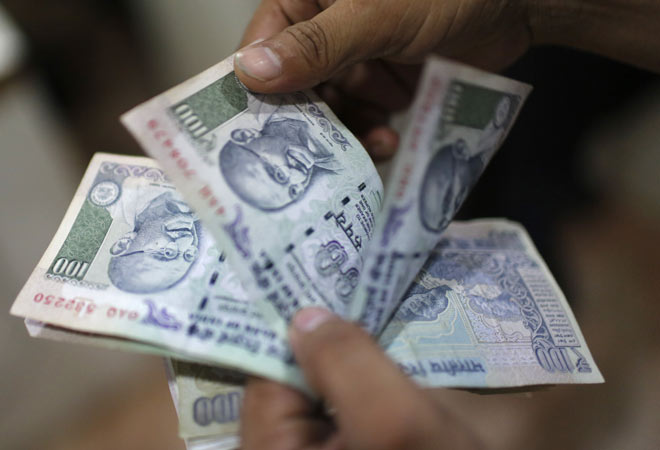 Indian rupee snaps 2-day fall, inches up to 59.27 against dollar