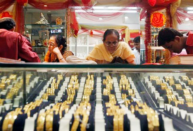 Govt hikes import tariff value on gold, silver Govt hikes import tariff value on gold, silver