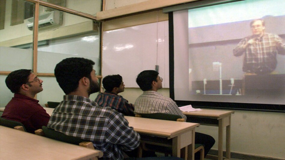 Indian students watch a downloaded videotaped lecture at the Quantum Institute in New Delhi (Photo:Reuters) Indian students watch a downloaded videotaped lecture at the Quantum Institute in New Delhi (Photo:Reuters)
