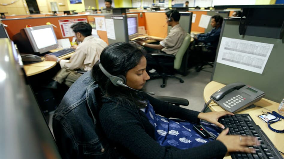 Employees at a call centre in Bangalore provide service support to international customers (Photo: Reuters) Employees at a call centre in Bangalore provide service support to international customers (Photo: Reuters)