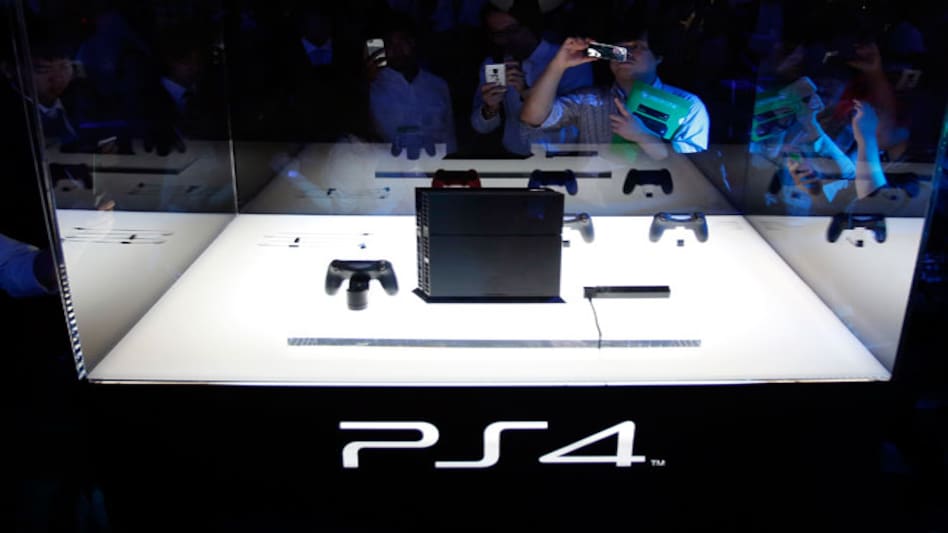 Visitors take pictures of Sony's PlayStation 4 gaming console at the Tokyo Game Show (Photo: Reuters) Visitors take pictures of Sony's PlayStation 4 gaming console at the Tokyo Game Show (Photo: Reuters)