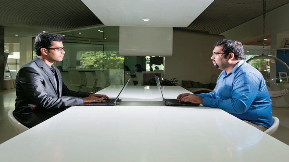 Equally good: Ali Akbar, armed with an MBA (left), and non-MBA Raghuraman S. at the Godrej office. Photo: Rachit Goswami Equally good: Ali Akbar, armed with an MBA (left), and non-MBA Raghuraman S. at the Godrej office. Photo: Rachit Goswami