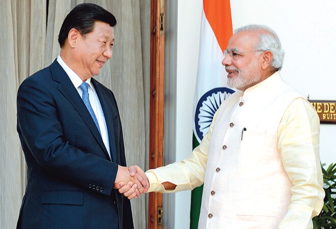 Chinese President Xi Jinping with Prime Minister Narendra Modi. Photo: Shekhar Ghosh. 