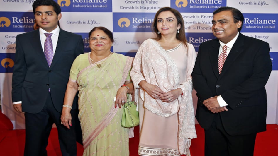 RIL Chairman Mukesh Ambani (right) with wife Nita (second from right), mother Kokilaben (second from left) and son Akash before addressing the company's annual shareholders' meeting in Mumbai on June 18, 2014. (Photo: Reuters) RIL Chairman Mukesh Ambani (right) with wife Nita (second from right), mother Kokilaben (second from left) and son Akash before addressing the company's annual shareholders' meeting in Mumbai on June 18, 2014. (Photo: Reuters)