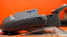 eBay follows Carl Icahn's advice, plans PayPal spin off in 2015 A PayPal card sits at a cashier station at a Home Depot store in Daly City, California, February 21, 2012. (Photo: Reuters)