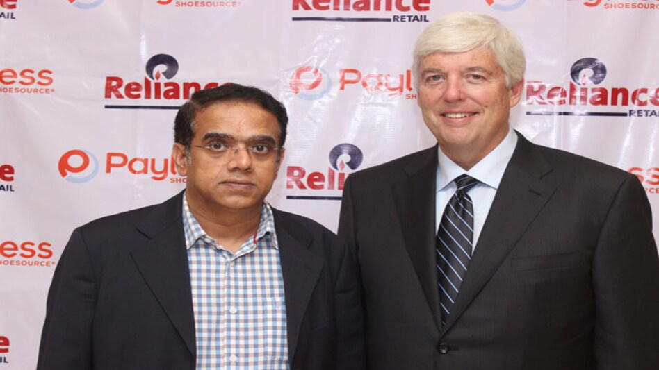 Reliance Retail's CEO of Footwear Business Gopalakrishnan Sankar (Left) with Payless ShoeSource Executive VP Steve Gish Reliance Retail's CEO of Footwear Business Gopalakrishnan Sankar (Left) with Payless ShoeSource Executive VP Steve Gish