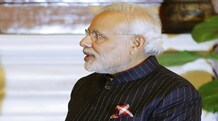 PM Modi's name-striped suit gave Michelle Obama stiff fashion competition Prime Minister Narenda Modi, wearing a dark pinstripe suit repeatedly embroidered with the words "Narendra Damodardas Modi", meets with U.S. President Barack Obama at Hyderabad House in New Delhi January 25, 2015. Photo: Reuters