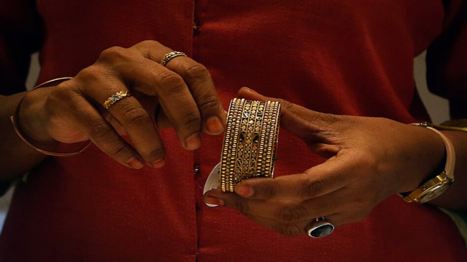 Gold prices gain on steady buying amid strong overseas cues; silver prices slip Gold prices gain on steady buying amid strong overseas cues; silver prices slip