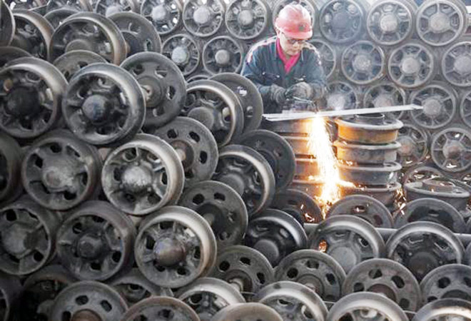 Industrial output growth likely slowed in February; March inflation subdued
