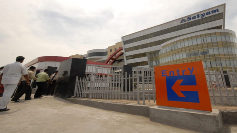 A 2009 photo of media standing outside the headquarters of Satyam Computer in Hyderabad (Photo: Reuters) A 2009 photo of media standing outside the headquarters of Satyam Computer in Hyderabad (Photo: Reuters)