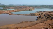 Goa resumes iron ore production after 3 years A general view shows the open pit of an iron ore mine in Codli village in Goa . Photo: Reuters