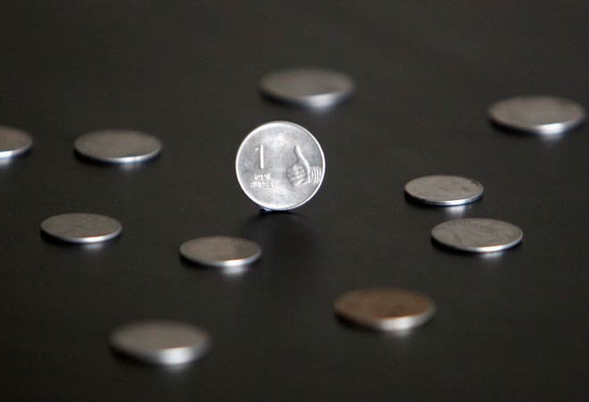 Rupee closes 11 paise lower at 66.54 