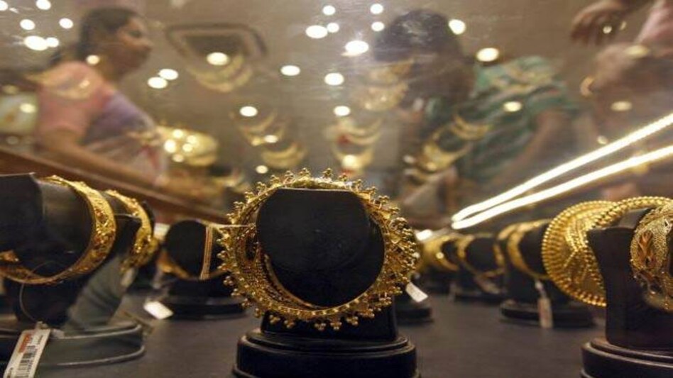 Gold prices slipped by Rs 100 to Rs 27,150 per ten grams. (Photo: Reuters) Gold prices slipped by Rs 100 to Rs 27,150 per ten grams. (Photo: Reuters)