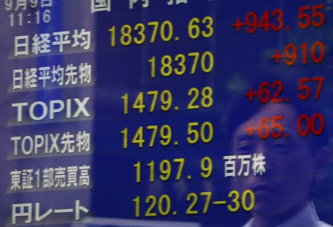 Asia shares hobbled by rising bets of looming US Federal Reserve hike