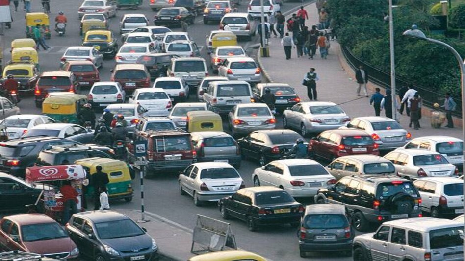 Experts say exemption to such a large number of vehicles would defeat the purpose of the road rationing experiment. Photo: Reuters Experts say exemption to such a large number of vehicles would defeat the purpose of the road rationing experiment. Photo: Reuters