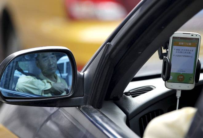 The appointment has add a new link in the relations between the ride hailing company and its investors, Alibaba and SoftBank Group. (Photo: Reuters)