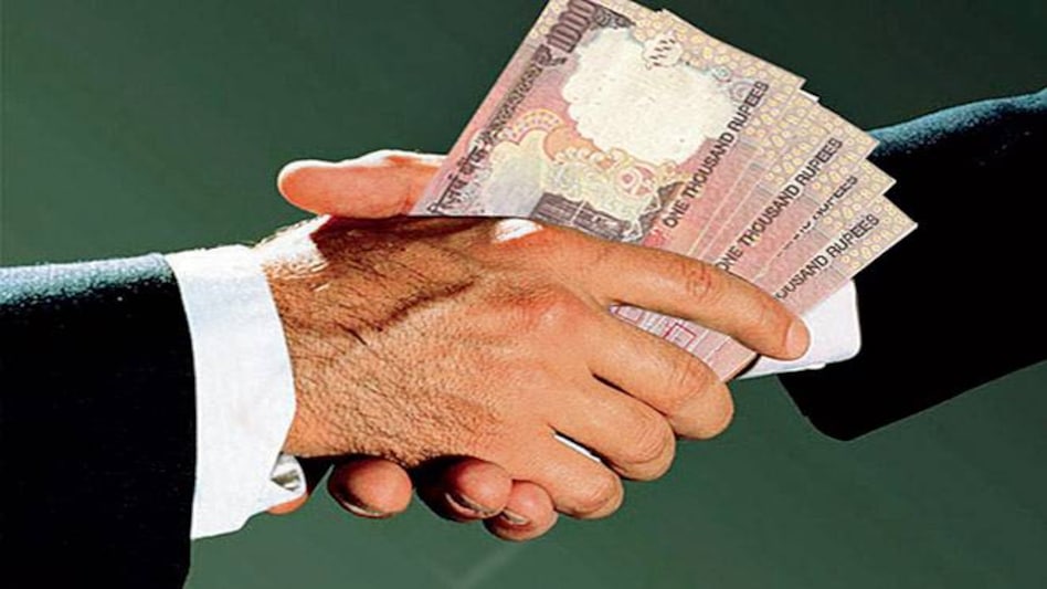 Sources said it is suspected that a syndicate involving senior tax officials and corporate houses are involved in the multicrore tax evasion net. Photo: Mail Today Sources said it is suspected that a syndicate involving senior tax officials and corporate houses are involved in the multicrore tax evasion net. Photo: Mail Today