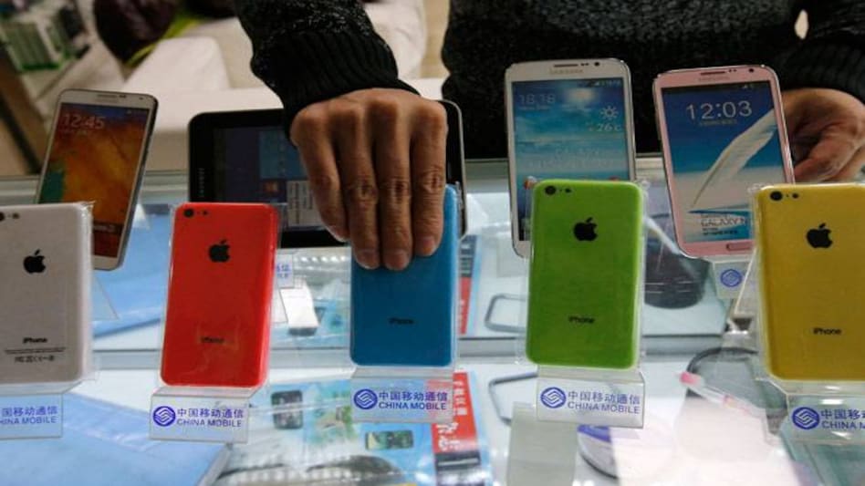 iPhone 4s was selling as low as Rs 12,000 while iPhone 5c was selling for Rs 20,000 in India. Apple's iPhone 5s at a price of Rs 24,000 is now the most lowest priced model of the company. (Photo: Reuters) iPhone 4s was selling as low as Rs 12,000 while iPhone 5c was selling for Rs 20,000 in India. Apple's iPhone 5s at a price of Rs 24,000 is now the most lowest priced model of the company. (Photo: Reuters)