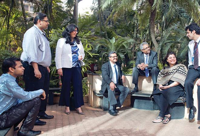 Forging a bond: Paresh Sukthankar (seated, third from right), Deputy Managing Director, HDFC Bank with his team (Photo: Rachit Goswami) Forging a bond: Paresh Sukthankar (seated, third from right), Deputy Managing Director, HDFC Bank with his team (Photo: Rachit Goswami)