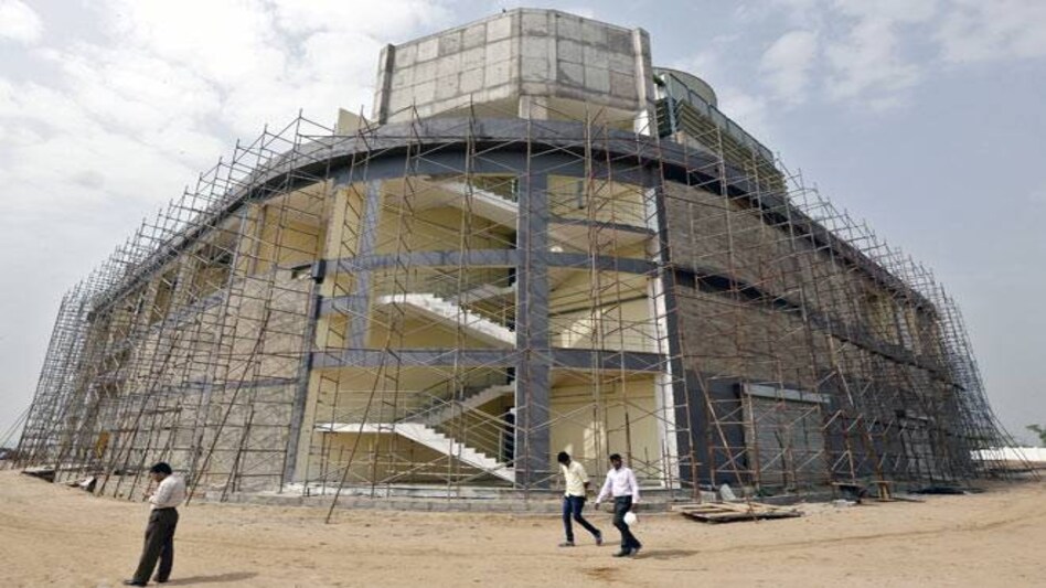 A cooling system plant under construction inside Gujarat International Finance Tec-City (GIFT) at Gandhinagar, in Gujarat. (Photo: Reuters) A cooling system plant under construction inside Gujarat International Finance Tec-City (GIFT) at Gandhinagar, in Gujarat. (Photo: Reuters)