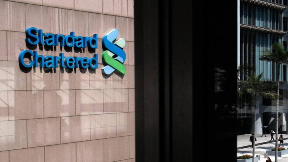 StanChart posts first loss in 26 years as revamp costs bite StanChart posts first loss in 26 years as revamp costs bite