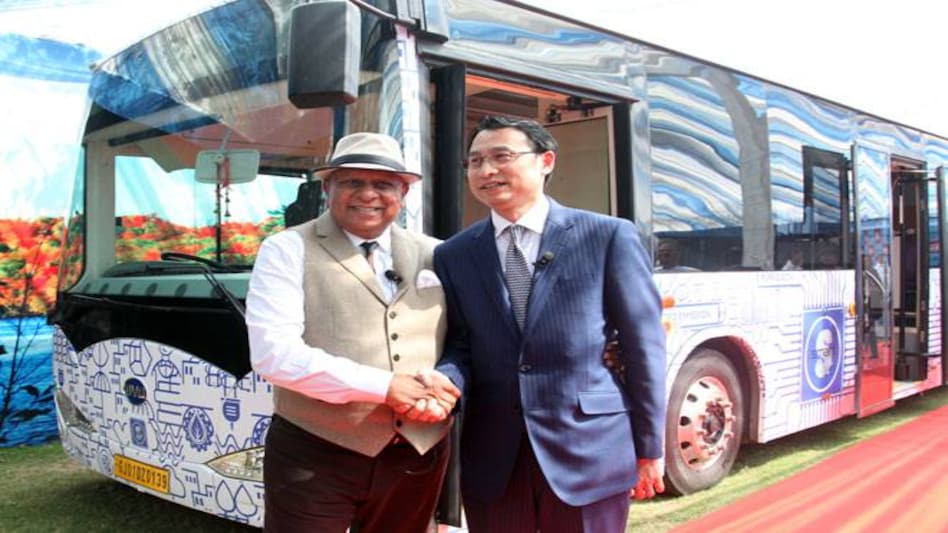 Left to right: B.K. Modi and Mr. Liu of BYD Company Limited unveil an electric bus manufacturing facility at ModiCiti (next to Muradabad), under the brand name 'Smart Dreams' Left to right: B.K. Modi and Mr. Liu of BYD Company Limited unveil an electric bus manufacturing facility at ModiCiti (next to Muradabad), under the brand name 'Smart Dreams'