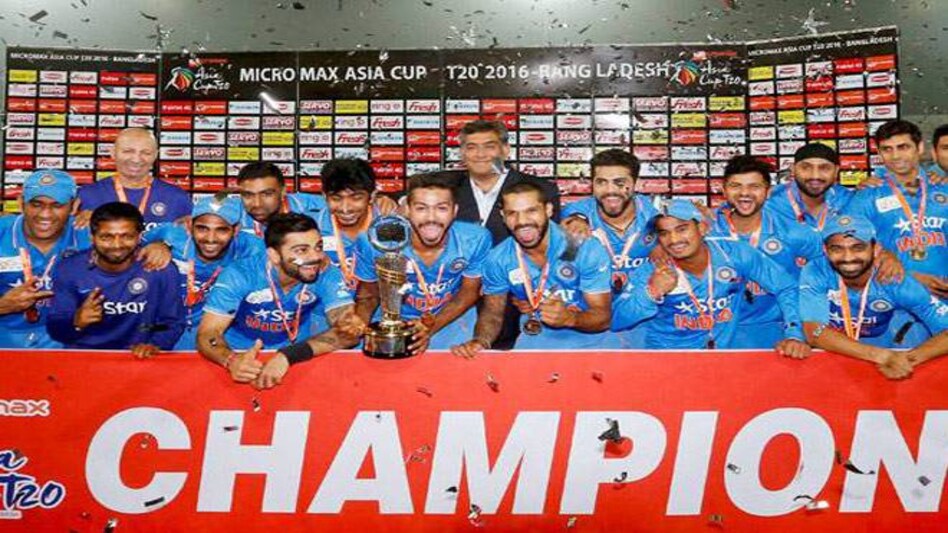 Indian cricket team poses after winning the Micromax Asia Cup T20 in Mirpur, Bangladesh on Sunday. Indian cricket team poses after winning the Micromax Asia Cup T20 in Mirpur, Bangladesh on Sunday.