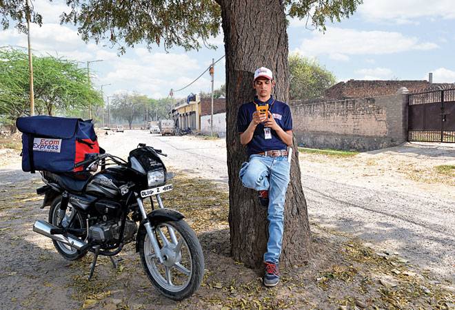 AAJAR KHAN: Stays with his wife and two children in Delhi. Joined Ecom Express in 2015 and makes Rs 10,000 a month. He uses the money for his children's education (Photo: Shekhar Ghosh) AAJAR KHAN: Stays with his wife and two children in Delhi. Joined Ecom Express in 2015 and makes Rs 10,000 a month. He uses the money for his children's education (Photo: Shekhar Ghosh)