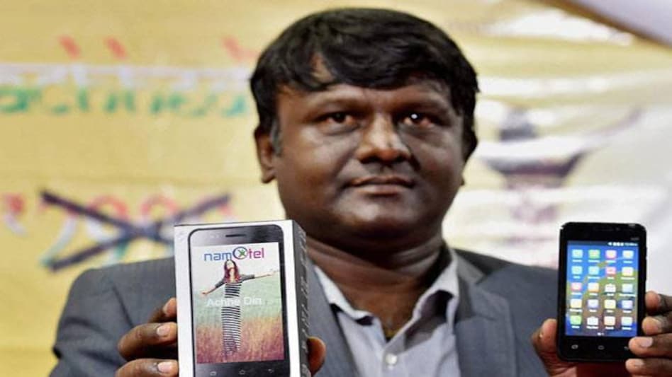 Namotel's Promoter Madhava Reddy displaying the World's cheapest smartphone Namotel Acche Din. Namotel's Promoter Madhava Reddy displaying the World's cheapest smartphone Namotel Acche Din.