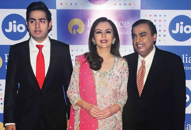 Reliance Industries CMD Mukesh Ambani with wife Nita and son Akash at the Jio launch (Photo: Milind Shelte) Reliance Industries CMD Mukesh Ambani with wife Nita and son Akash at the Jio launch (Photo: Milind Shelte)