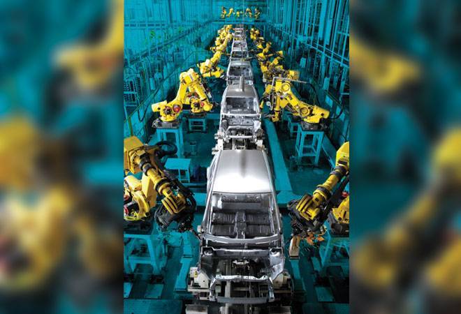 ROBOTS AT WORK The Press and Weld shop at Maruti Suzuki's Manesar plant (Photographs Courtesy Companies) ROBOTS AT WORK The Press and Weld shop at Maruti Suzuki's Manesar plant (Photographs Courtesy Companies)