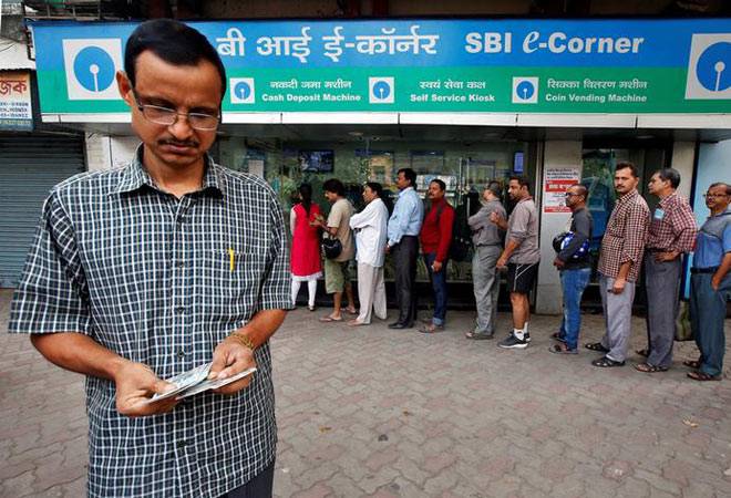 Anger, frustration at ATMs as people wait in long queues for hours
