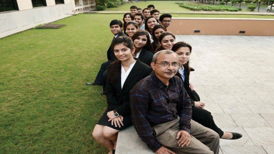 SKY'S THE LIMIT: Uttam Kumar Sarkar, Dean at IIM Calcutta, with students (Photo: Subir Halder) SKY'S THE LIMIT: Uttam Kumar Sarkar, Dean at IIM Calcutta, with students (Photo: Subir Halder)